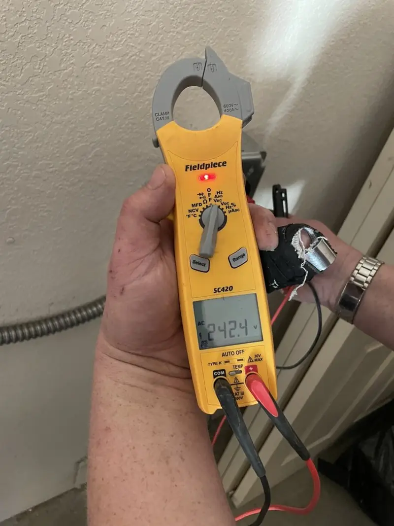 Voltage testing with clamp meter during Hot Tub / Pool Electrical Wiring in New Scotland